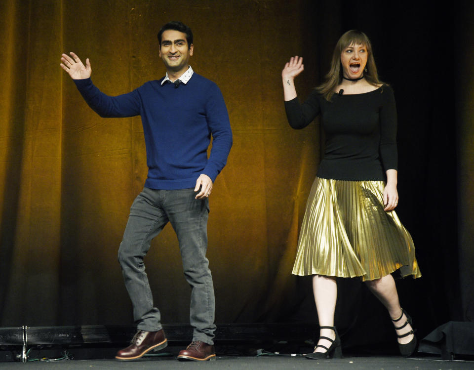 Kumail Nanjiani, left, and his wife Emily Gordon, the co-writers of the upcoming film "The Big Sick," are introduced onstage during the Amazon Studios presentation at CinemaCon 2017 at Caesars Palace on Thursday, March 30, 2017, in Las Vegas. Nanjiani also stars in the film. (Photo by Chris Pizzello/Invision/AP)