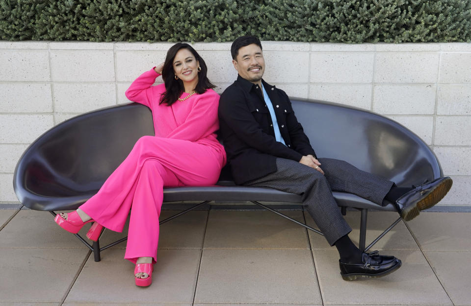 Melissa Fumero, left, and Randall Park, cast members in the Netflix series "Blockbuster," pose together for a portrait, Monday, Oct. 24, 2022, in Los Angeles. (AP Photo/Chris Pizzello)