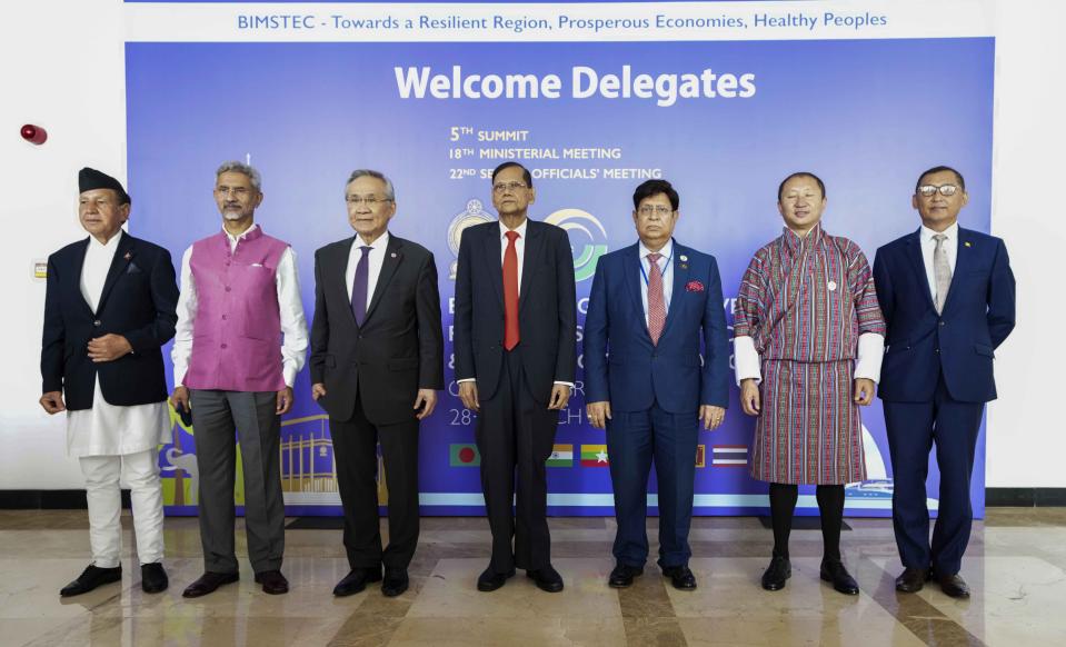 Foreign Ministers of the Bay of Bengal Initiative for Multi-Sectoral Technical and Economic Cooperation (BIMSTEC) countries, from left to right, Nepal's Narayan Khadka, India's Subrahmanyam Jaishankar, Don Pramudwinai of Thailand, Gamini Lakshman Peiris of Sri Lanka, A.K. Abdul Momen of Bangladesh, Tandi Dorji of Bhutan and Myanmar's Wunna Maung Lwin pose for a photograph during their meeting in Colombo, Sri Lanka, Tuesday, March 29, 2022. (AP Photo/Eranga Jayawardena)