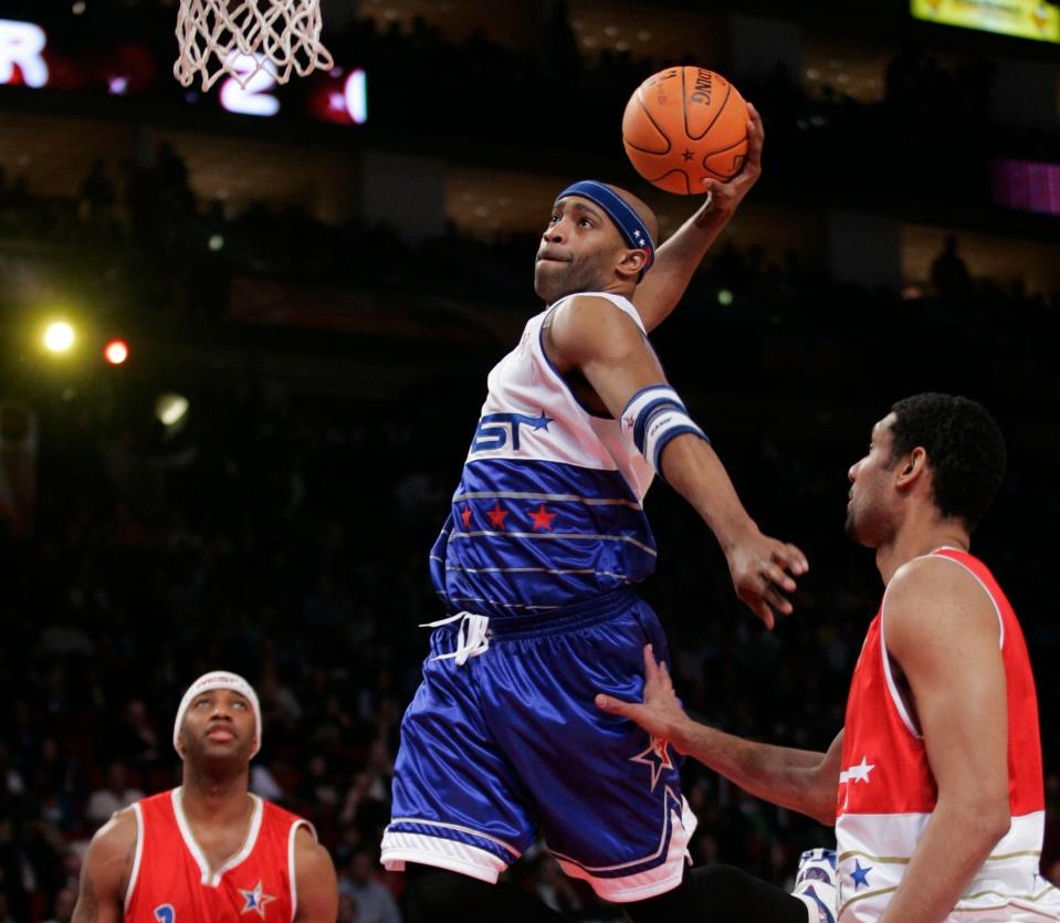 Vince Carter goes for a dunk during the 2006 NBA All-Star Game.