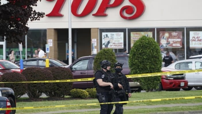 Police secure an area around a Tops supermarket in Buffalo, N.Y., where 10 people were killed in a May shooting. New York’s new law barring sales of bullet-resistant vests to most civilians doesn’t cover the type of armor worn by the gunman who slayed them, a gap that could limit its effectiveness in deterring future military-style assaults. (Photo: Derek Gee/The Buffalo News via AP, File)