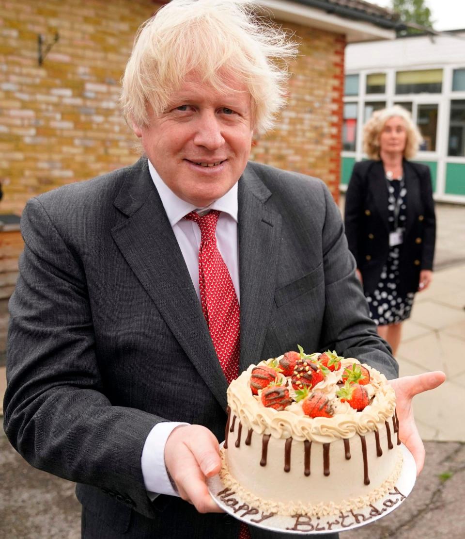 Boris Johnson had been presented with a birthday cake earlier in the day during a visit to a school - Andrew Parsons/10 Downing Street/AFP via Getty Images