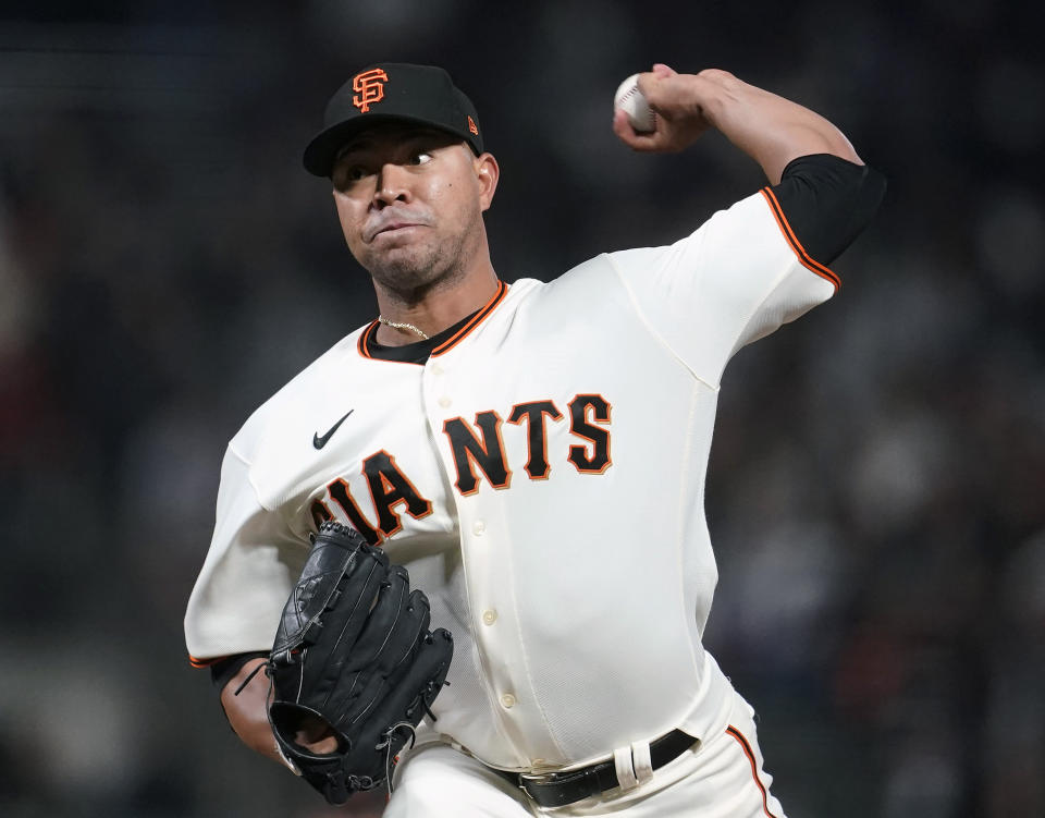 FILE - San Francisco Giants' Jose Quintana pitches against the San Diego Padres during a baseball game in San Francisco, Sept. 15, 2021. Quintana, 32, signed a one-year deal with the Pittsburgh Pirates on Monday, Nov. 29, 2021. (AP Photo/Jeff Chiu, File)