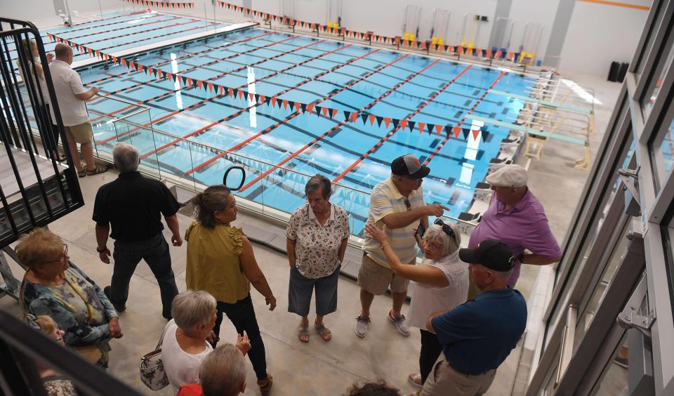 Visitors look around the swimming pool of the new Ames High School building during an open house Saturday, Aug. 27, 2022, in Ames, Iowa.