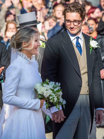 <p>Danny Lawson/PA Images/Getty </p> Ellie Goulding and Caspar Jopling on their wedding day in August 2019.