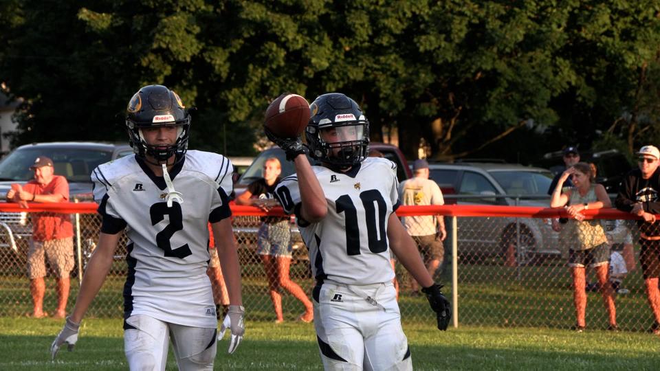 Hillsdale junior Jace Lennox (10) scores three touchdowns, including his first on varsity, in Hillsdale's 40-8 win over Jonesville.