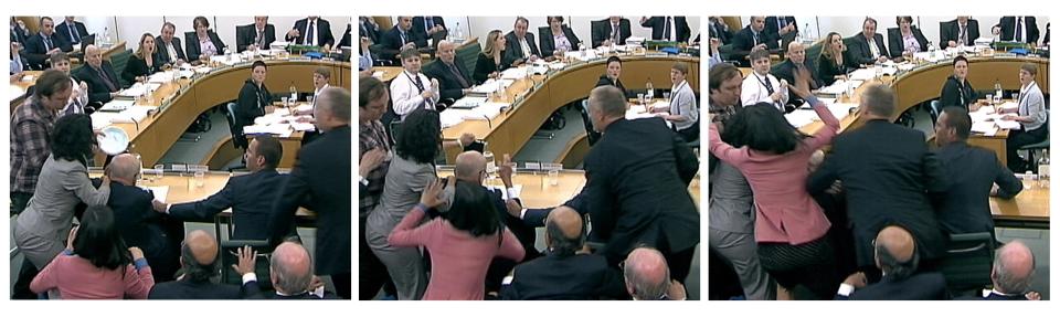 This combination picture of still images shows a man trying to attack Rupert Murdoch during a parliamentary committee hearing on phone hacking.