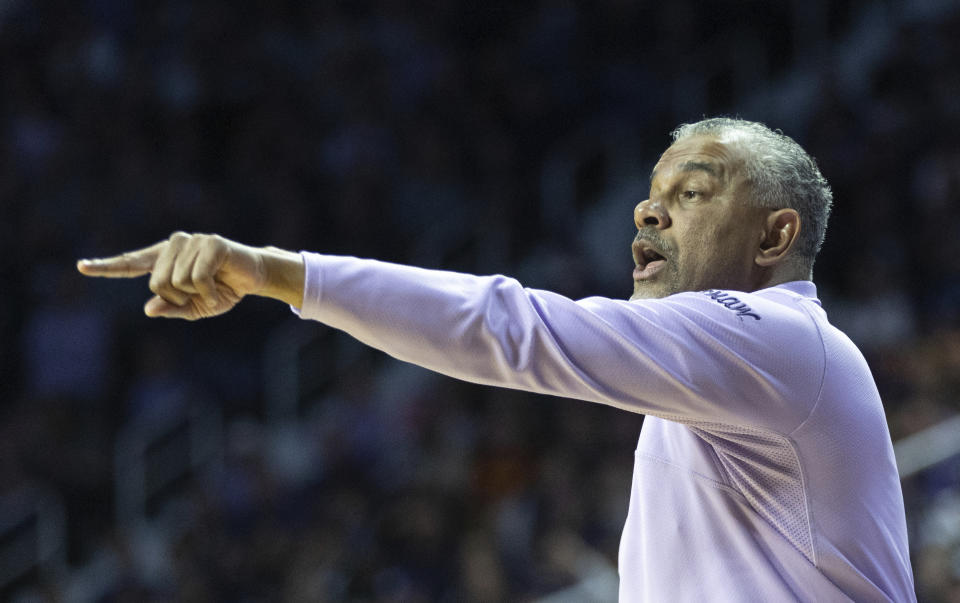 Kansas State coach Jerome Tang yells out instructions to his team during the first half of an NCAA college basketball game against Iowa State on Saturday, Feb. 18, 2023, in Manhattan, Kan. (AP Photo/Travis Heying)