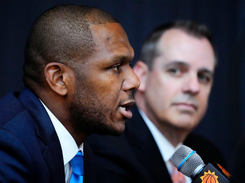General manager James Jones introduces Frank Vogel as the new head coach of the Phoenix Suns during a news conference at Footprint Center in Phoenix on June 6, 2023.