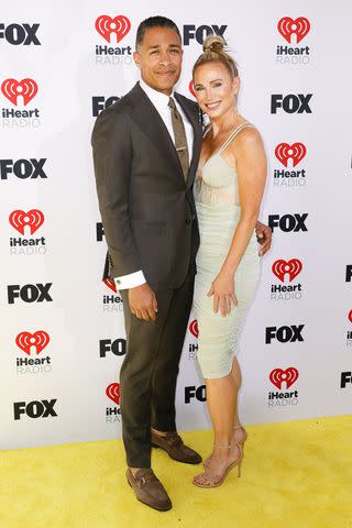 <p>Frazer Harrison/Getty</p> T.J. Holmes (left) and Amy Robach (right)