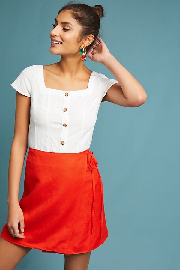 Get it at <a href="https://www.anthropologie.com/shop/holly-mini-wrap-skirt?category=SEARCHRESULTS&amp;color=063" target="_blank">Anthropologie</a>, $138.