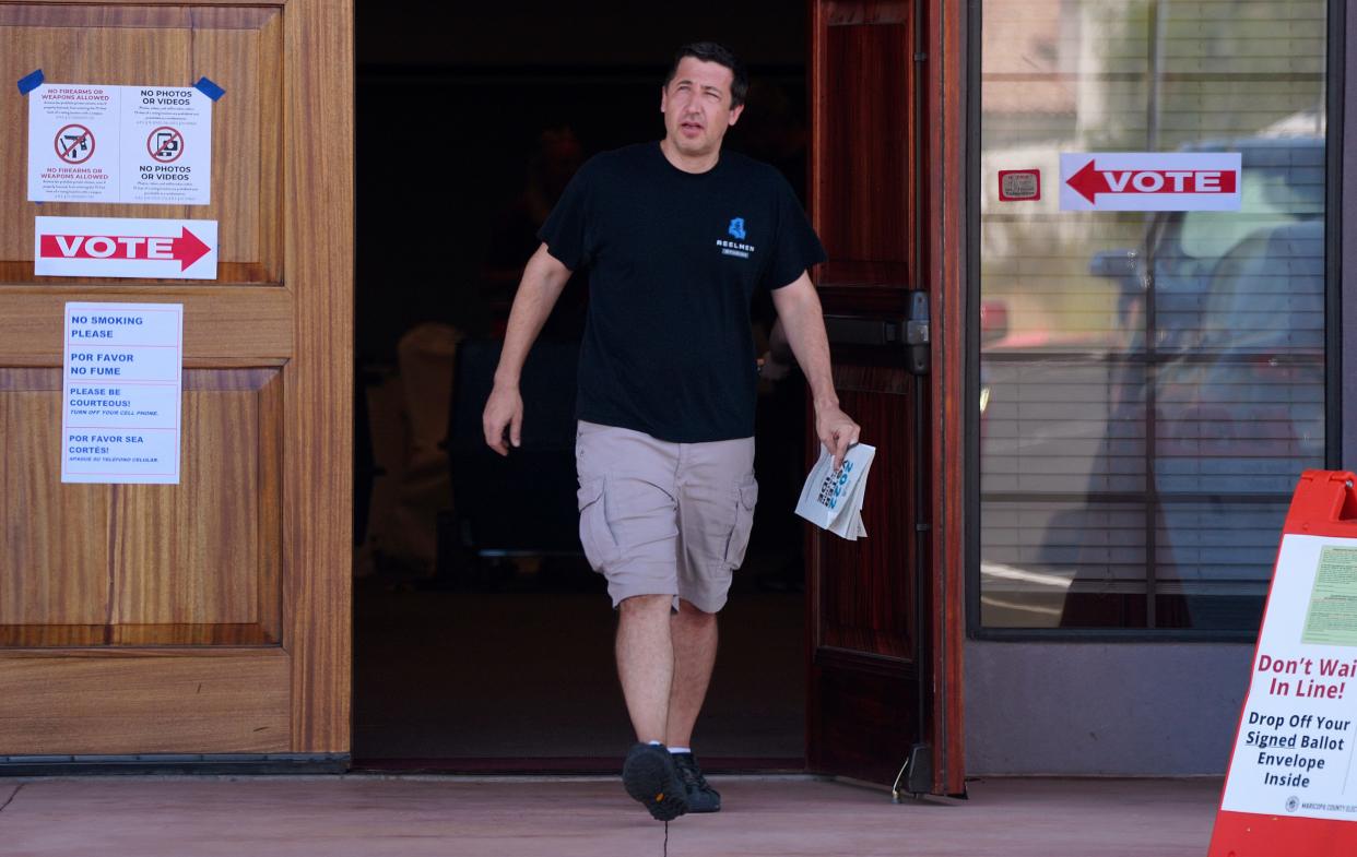 A voter departs from the polling place inside the Islamic Center in Scottsdale on Aug. 2, 2022.