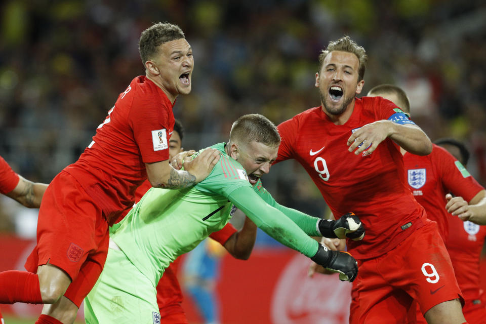 England’s Harry Kane, right, goalkeeper Jordan Pickford, centre, and Kieran Trippier celebrate at the end of the round of 16 match between Colombia and England at the 2018 soccer World Cup in the Spartak Stadium, in Moscow, Russia, Tuesday, July 3, 2018. England won after a penalty shoot out. (AP Photo/Victor R. Caivano)