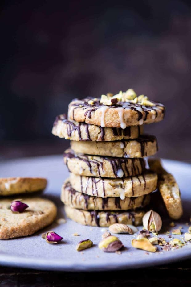 <p><a href="https://www.halfbakedharvest.com/pistachio-butter-cookies-with-chocolate-tres-leches-drizzle/" rel="nofollow noopener" target="_blank" data-ylk="slk:Half Baked Harvest" class="link ">Half Baked Harvest</a></p>