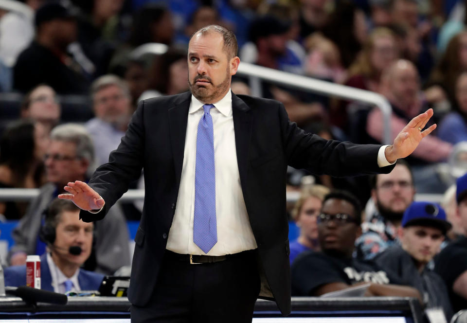 Orlando Magic head coach Frank Vogel directs his players against the Washington Wizards during the first half of an NBA basketball game, Wednesday, April 11, 2018, in Orlando, Fla. (AP Photo/John Raoux)