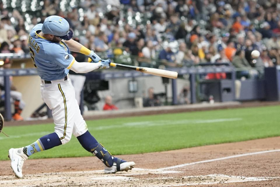 Milwaukee Brewers' Owen Miller hits a single during the fifth inning of a baseball game against the Baltimore Orioles Wednesday, June 7, 2023, in Milwaukee. (AP Photo/Morry Gash)