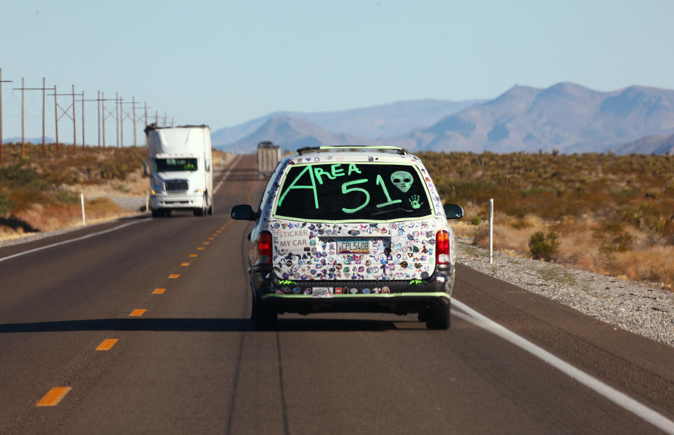 A car drives with 'Area 51' written on the back before the start of a 'Storm Area 51' spinoff event called 'Area 51 Basecamp' on Sept. 20, 2019 near Alamo, Nevada. (Photo: Mario Tama/Getty Images)