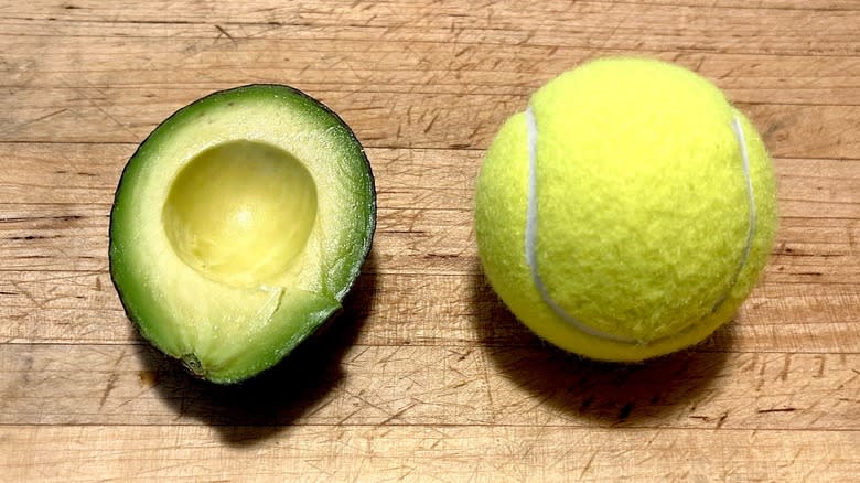 Avocado and tennis ball