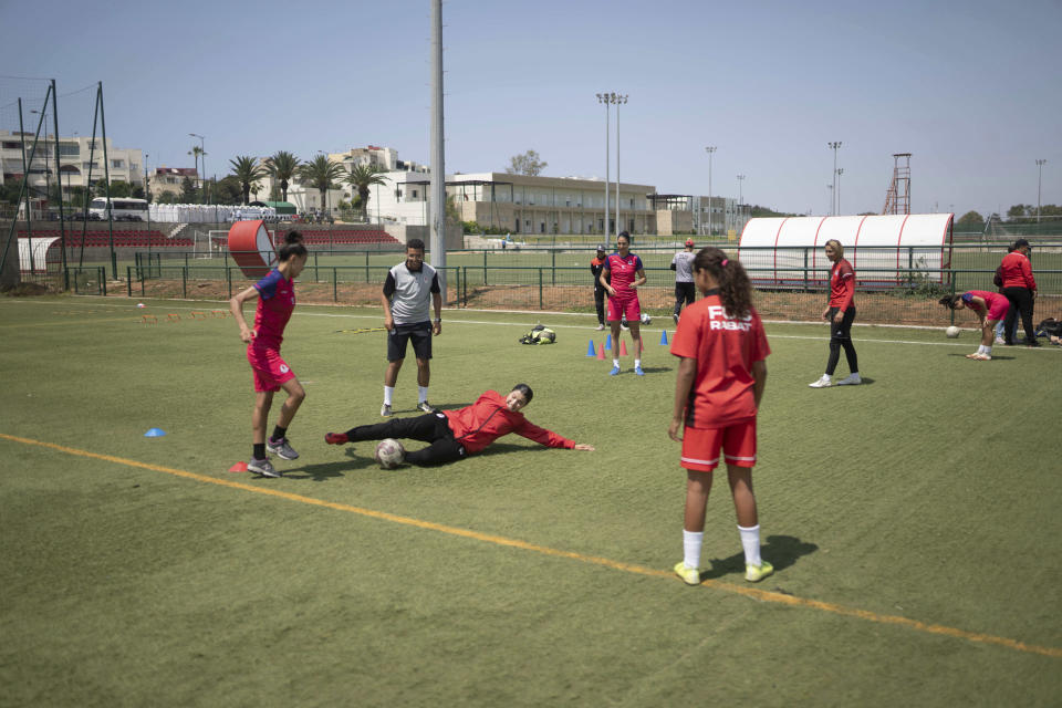 Women players of Fath Union Sport soccer team take part in a training session in Rabat, Morocco, Friday, May 19, 2023. (AP Photo/Mosa'ab Elshamy)