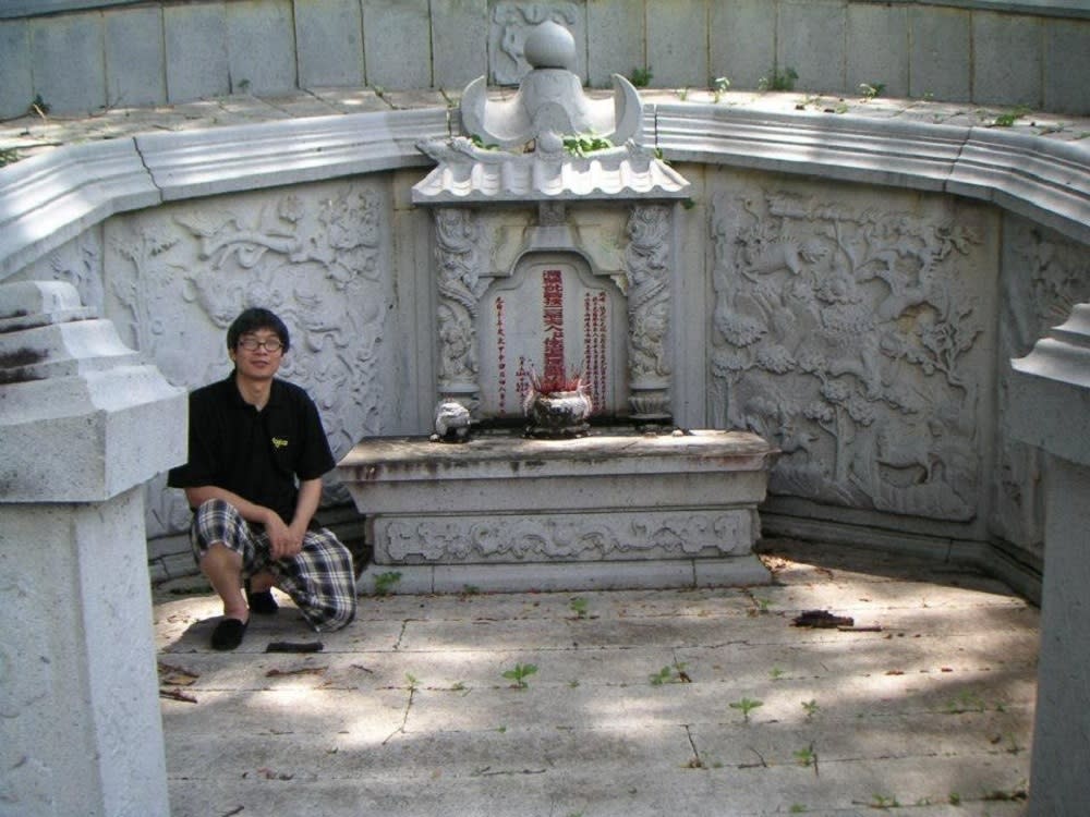 A descendant of Chung Keng Quee and Foo Teng Nyong, Jeffery Seow, at the tomb many years ago. ― Picture courtesy of Jeffery Seow