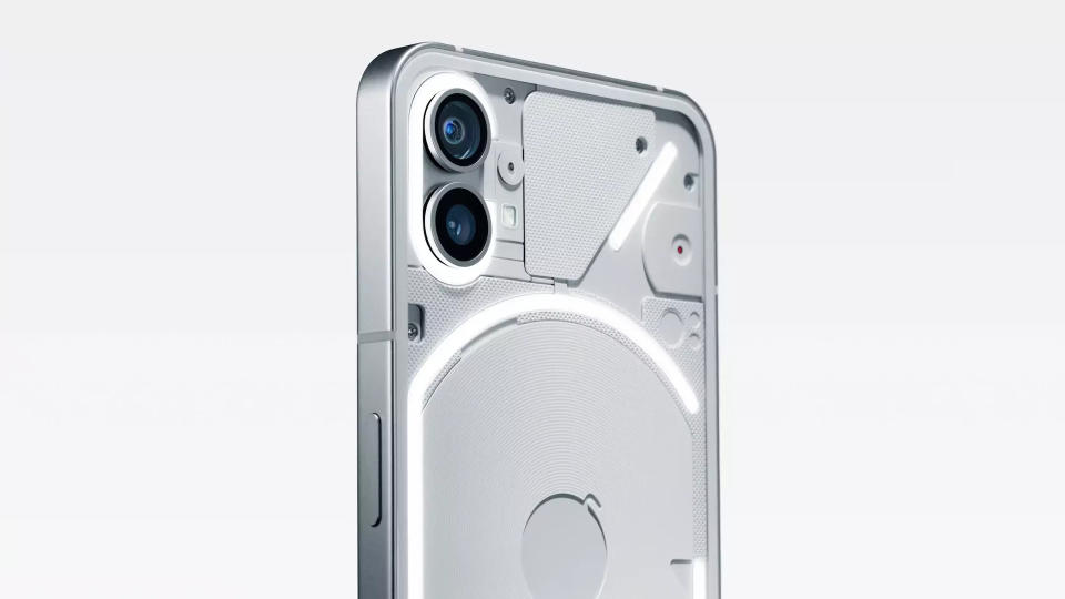 A press shot of the white Nothing Phone 1, showing the LED lights and camera on the smartphone.