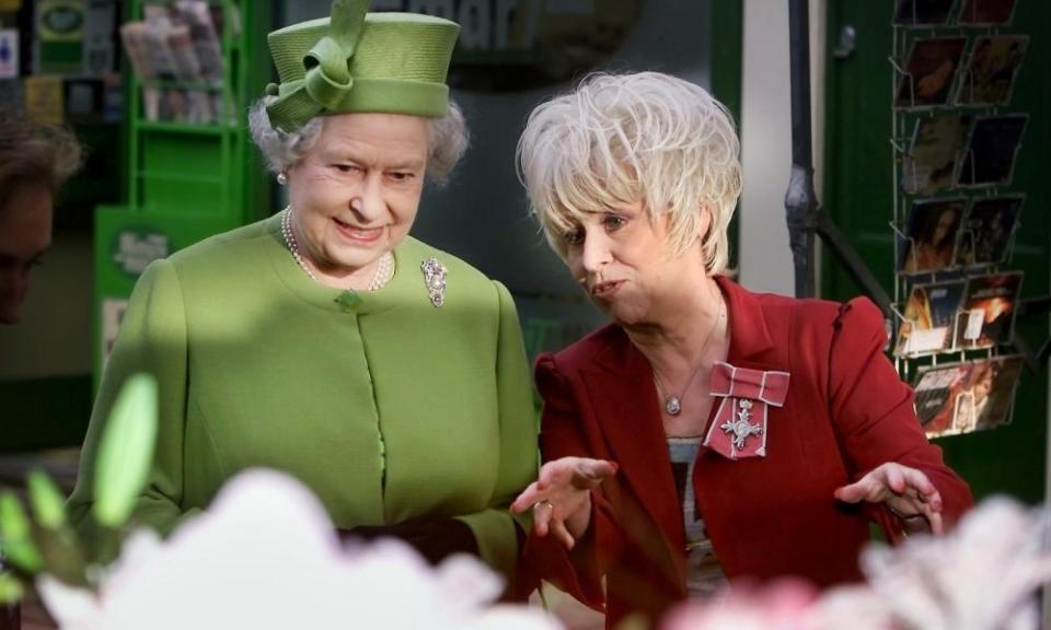 Barbara Windsor with the Queen on her visit to the EastEnders set at Elstree in 2001.