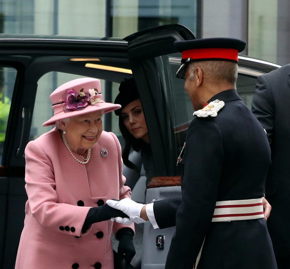 Queen Elizabeth and Catherine, Duchess of Cambridge arrive to open Bush House at King's College in London on Tuesday. (Photo: Simon Dawson / Reuters)