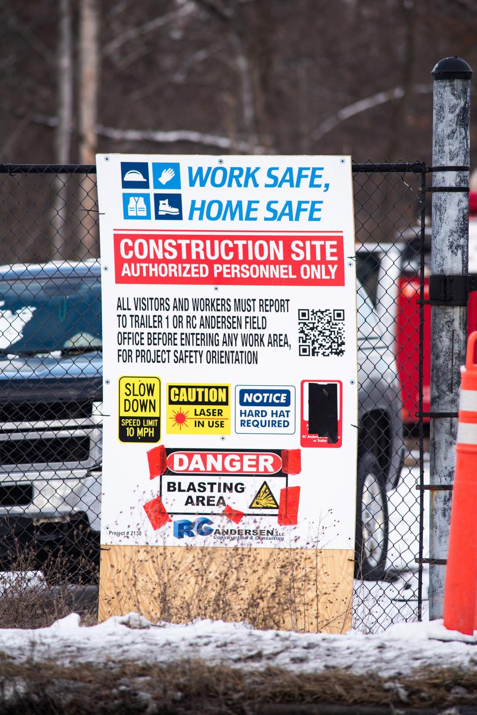 A construction sign stands along a fence at a construction site along Route 300 in Newburgh, NY on Friday, January 7, 2022.