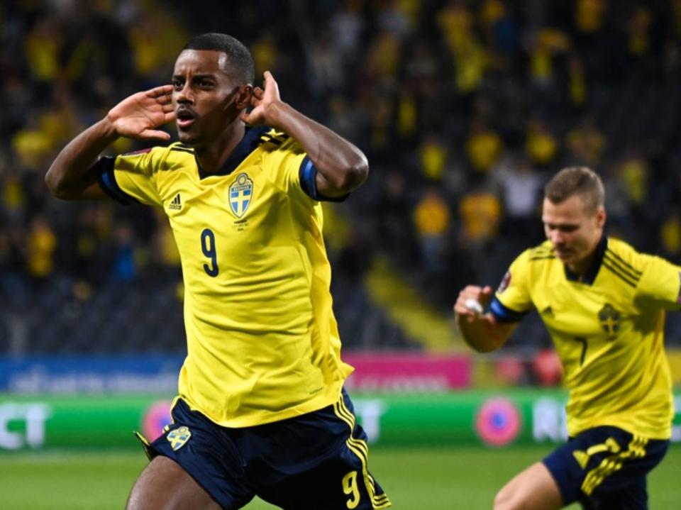 Isak celebrates scoring against Spain in September’s World Cup qualifiers (AFP via Getty Images)