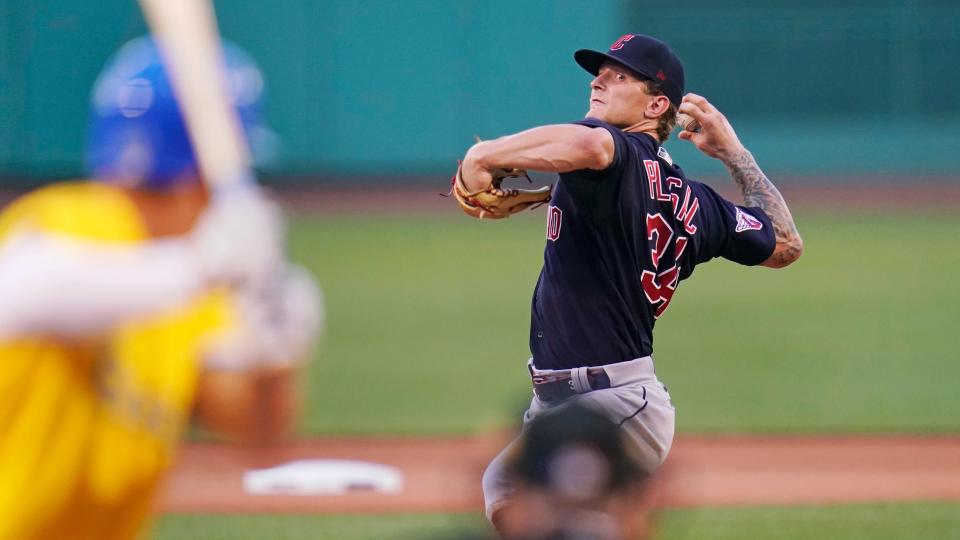 Cleveland Guardians starting pitcher Zach Plesac delivers during the first inning of a baseball game against the Boston Red Sox at Fenway Park, Monday, July 25, 2022, in Boston. (AP Photo/Charles Krupa)