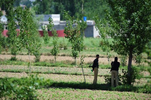 Pakistani policemen cordon of the hideout where Al-Qaeda leader Osama bin Laden was killed by a ground operation by US special forces