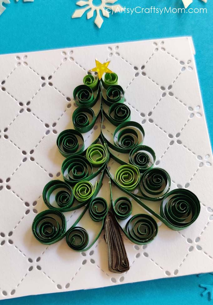 <p>Use quilling <a href="https://www.amazon.com/Quilling-Strips-Paper-Gradient-Colors/dp/B08C7KGJV6?tag=syn-yahoo-20&ascsubtag=%5Bartid%7C10055.g.4080%5Bsrc%7Cyahoo-us" rel="nofollow noopener" target="_blank" data-ylk="slk:paper strips;elm:context_link;itc:0;sec:content-canvas" class="link ">paper strips</a> to achieve the beautiful scrolls that make up this Christmas tree. If this seems too advanced, this crafter has also developed a <a href="https://artsycraftsymom.com/paper-quilling-christmas-tree-ornament/" rel="nofollow noopener" target="_blank" data-ylk="slk:quilling paper tree ornament;elm:context_link;itc:0;sec:content-canvas" class="link ">quilling paper tree ornament</a> that's easier for little ones.</p><p><a href="https://artsycraftsymom.com/quilling-christmas-tree-card/" rel="nofollow noopener" target="_blank" data-ylk="slk:Get the tutorial at Artsy Craftsy Mom »;elm:context_link;itc:0;sec:content-canvas" class="link "><em>Get the tutorial at Artsy Craftsy Mom »</em></a> </p>