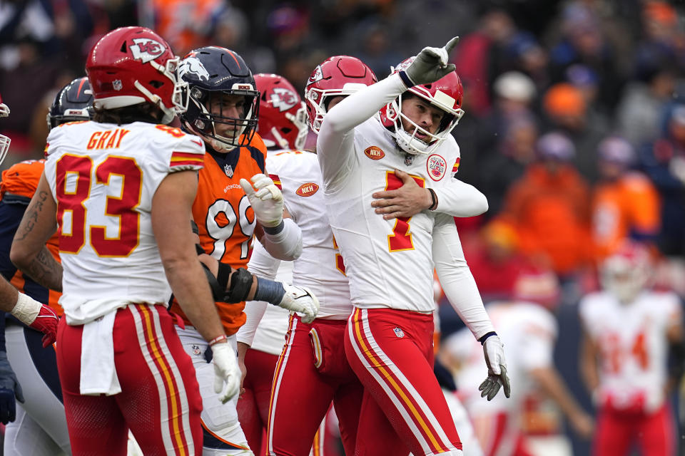 Kansas City Chiefs place-kicker Harrison Butker is congratulated by teammates after making a 56-yard field goal during the first half of an NFL football game Sunday, Oct. 29, 2023, in Denver. (AP Photo/Jack Dempsey)