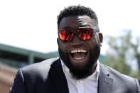 FILE - In this June 22, 2017, file photo, retired Boston Red Sox designated hitter David Ortiz, smiles outside Fenway Park in Boston. Ortiz returned to Boston for medical care after being shot in a bar Sunday, June 9, 2019, in his native Dominican Republic. (AP Photo/Charles Krupa, File)