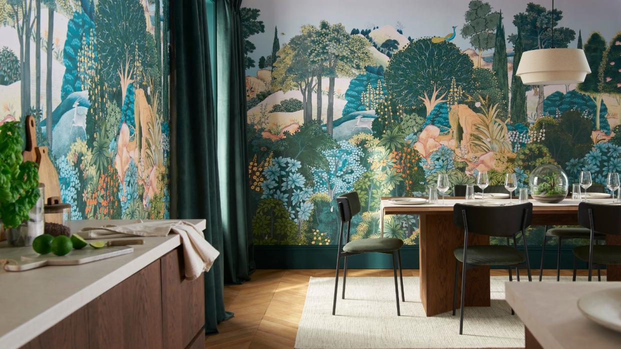  dining room with green wallpaper 