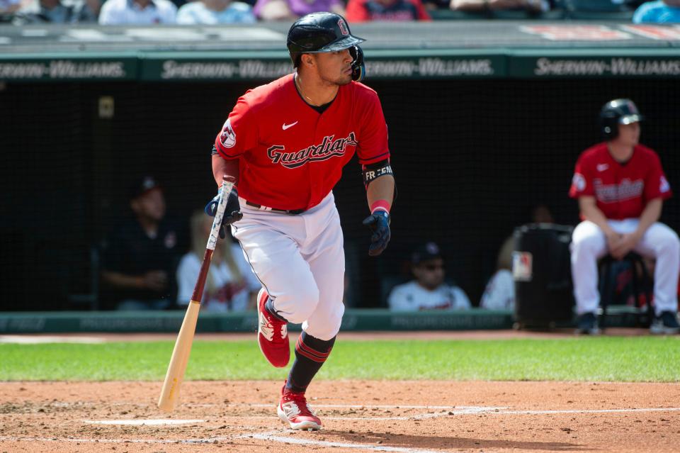 Cleveland Guardians' Tyler Freeman watches his RBI single off Texas Rangers starter Cody Bradford on Sunday in Cleveland.