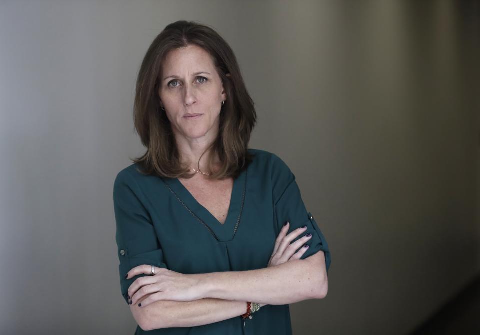 Kim Goldman poses for a portrait Friday, June 7, 2019, in Los Angeles. Goldman has continued to make the case publicly that it was O.J. Simpson who killed her brother and Simpson's ex-wife on a June night in 1994. Beginning Wednesday, Goldman will examine the case in a 10-episode podcast, "Confronting: OJ Simpson." She'll interview her brother's old friends, the police detective who investigated the killings, attorneys for the defense and prosecution, and two of the 12 jurors who voted to acquit Simpson. (AP Photo/Marcio Jose Sanchez)