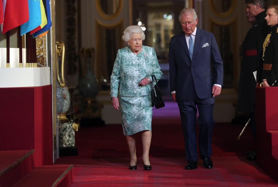 Queen Elizabeth II and Prince Charles attend the formal opening of the&nbsp;Commonwealth Heads of Government Meeting on Thursday.&nbsp;Camilla, Duchess of Cornwall, Prince Harry and Prince William also attended.&nbsp; (Photo: WPA Pool via Getty Images)