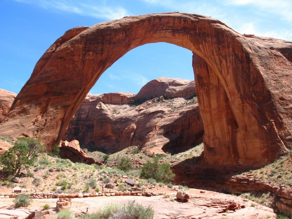 An arc of rock forms the Rainbow Bridge in Utah.