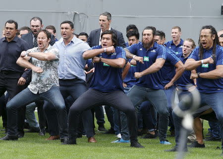 Former and present All Black's perform a Haka as former All Black Jonah Lomu's casket is carried out of Eden Park during his memorial service in Auckland, New Zealand, November 30, 2015. REUTERS/Nigel Marple