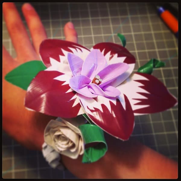 <div class="caption-credit"> Photo by: ducttapeetc</div>We've seen duct tape gowns, but this is the first duct tape corsage!