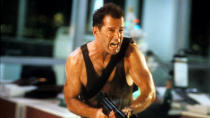 <p> John McClane (Bruce Willis), a New York City police officer, leaves the Big Apple and heads to Los Angeles to attend a Christmas party with his estranged wife at her Los Angeles high-rise. But the reunion is cut short when a group of terrorists led by Hans Gruber (Alan Rickman) takes over the tower and holds the guests ransom. </p> <p> People will always go back and forth on whether or not <em>Die Hard</em> is a Christmas movie, but there is no debate when it comes to how Bruce Willis helped redefine the action star in an era mostly made up of muscle-bound men armed to the teeth. </p>