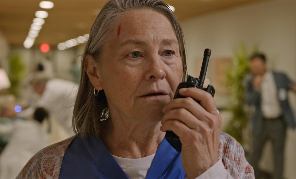 Cherry Jones talks into a walkie talkie