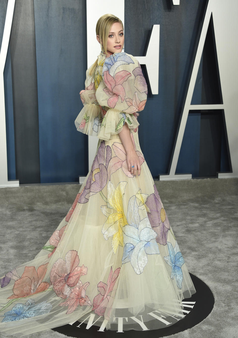 FILE - Lili Reinhart arrives at the Vanity Fair Oscar Party on Feb. 9, 2020, in Beverly Hills, Calif. Reinhart turns 24 on Sept. 13. (Photo by Evan Agostini/Invision/AP, File)