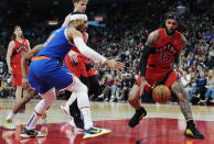 Toronto Raptors guard Gary Trent Jr. (33) tries to keep the ball from New York Knicks guard Josh Hart (3) during the first half of an NBA basketball game Wednesday, March 27, 2024, in Toronto. (Frank Gunn/The Canadian Press via AP)