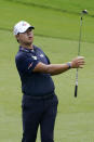 Si Woo Kim, of South Korea, hits from the fairway on the ninth hole during the second round of the Wyndham Championship golf tournament at Sedgefield Country Club on Friday, Aug. 14, 2020, in Greensboro, N.C. (AP Photo/Chris Carlson)