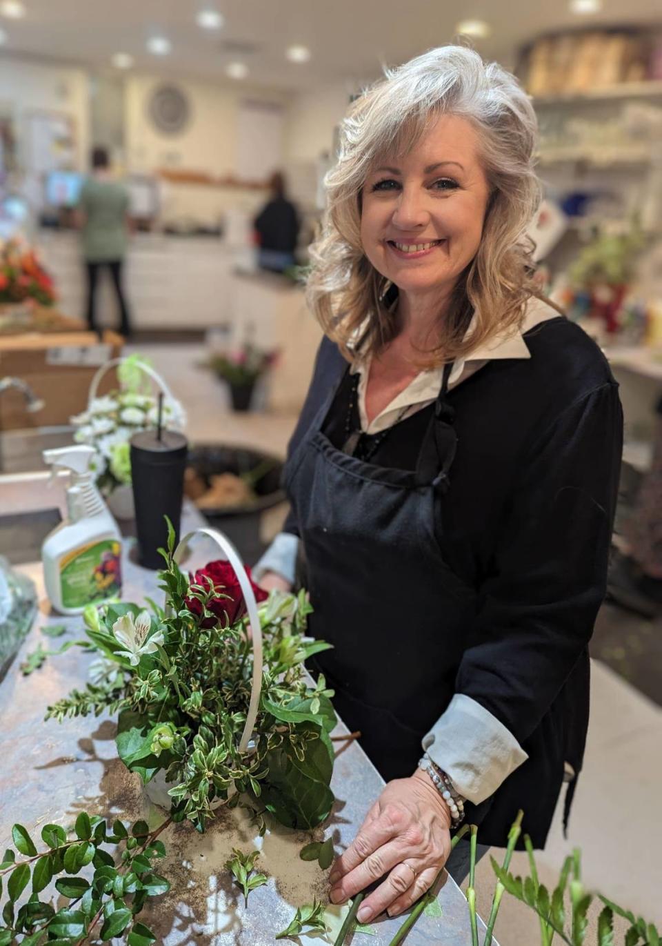 Kim Solheim purchased Arlene’s Flowers and Gifts last year and is starting a new chapter that puts the shop’s recent fractious history in the past.