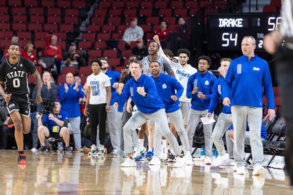 The Drake bench celebrates a basket by Roman Penn against Mississippi State in the last minute of a game Tuesday in Lincoln, Neb.