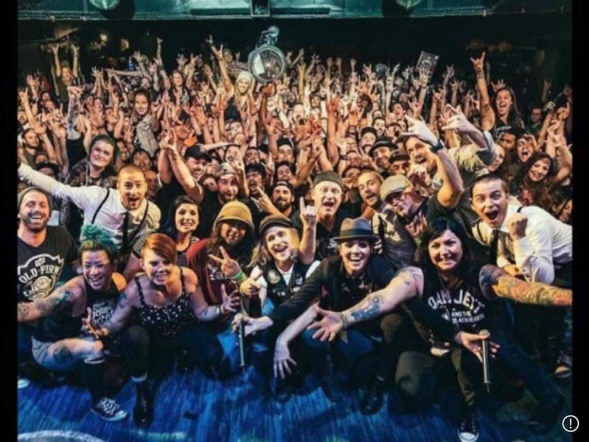 Festival organizers say judging by ticket sales, audiences are ready to return to shows. This photo shows appreciative fans at at recent K-Man & The 45s show. The band plays as part of the Living Roots Music Festival in Fredericton on June 2. (Living Roots Music Festival/Facebook - image credit)