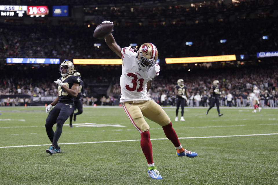 San Francisco 49ers running back Raheem Mostert (31) celebrates a touchdown in the first half an NFL football game against the New Orleans Saints in New Orleans, Sunday, Dec. 8, 2019. (AP Photo/Brett Duke)